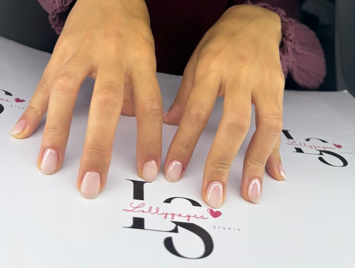 Natural BIAB manicure in soft pink on a Lollygagss Studio branded mat, Kerobokan Bali